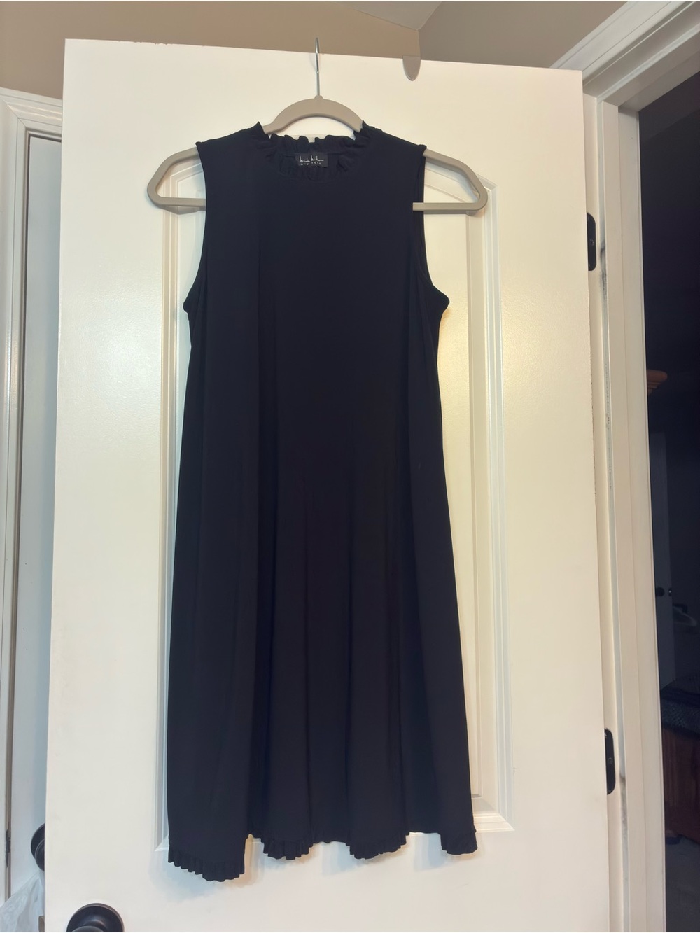 Sleek Black Sleeveless Midi Dress with High Neck